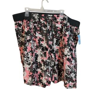 Woman Within Pink and Black Floral Shorts